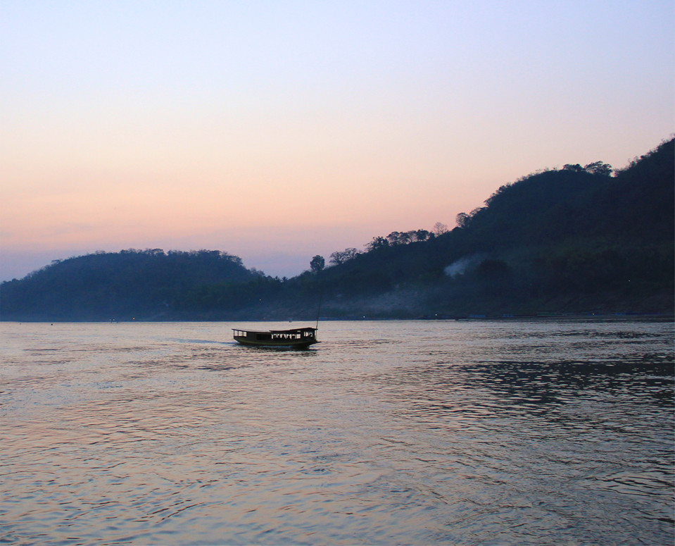 take a river cruise through luang prabang